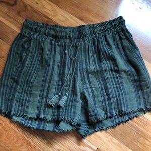 Flowy green shorts with cute frills